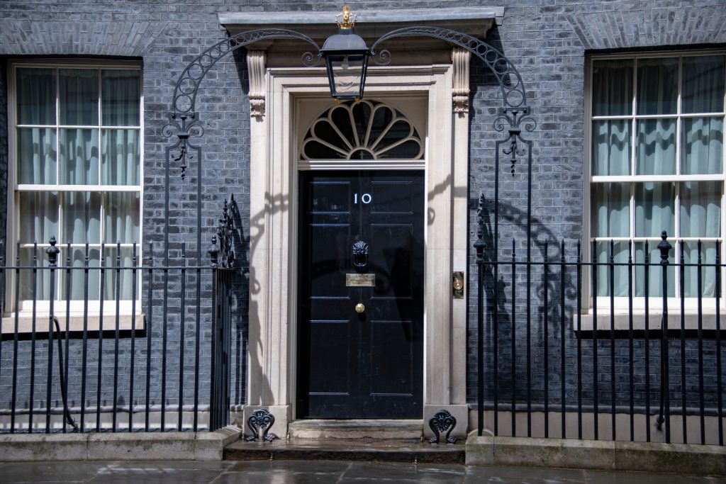 What Andy Burnham's plans could mean for businesses in financial distress - A black door and windows on a gray building.